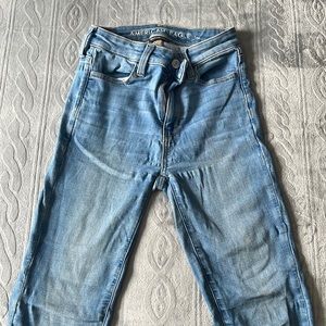 American eagle super high rise blue skinny jegging. Size 0.